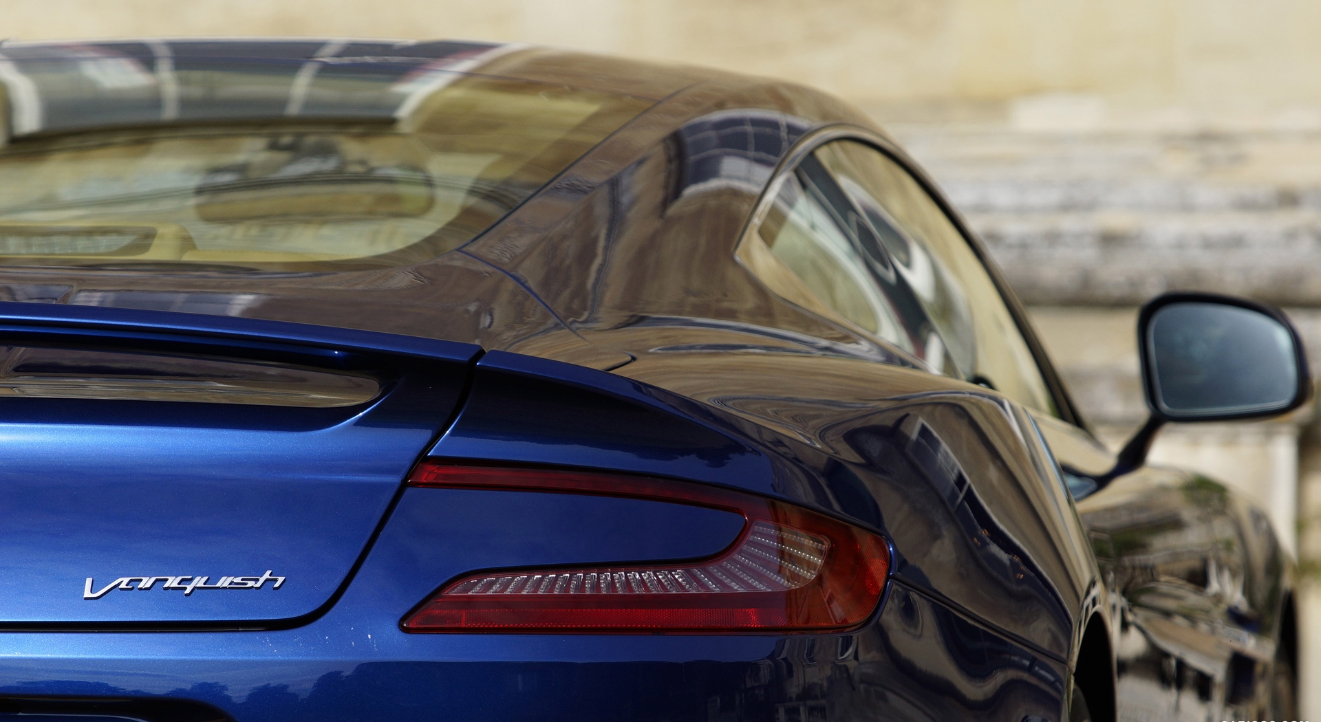 Aston Martin Vanquish blue A4