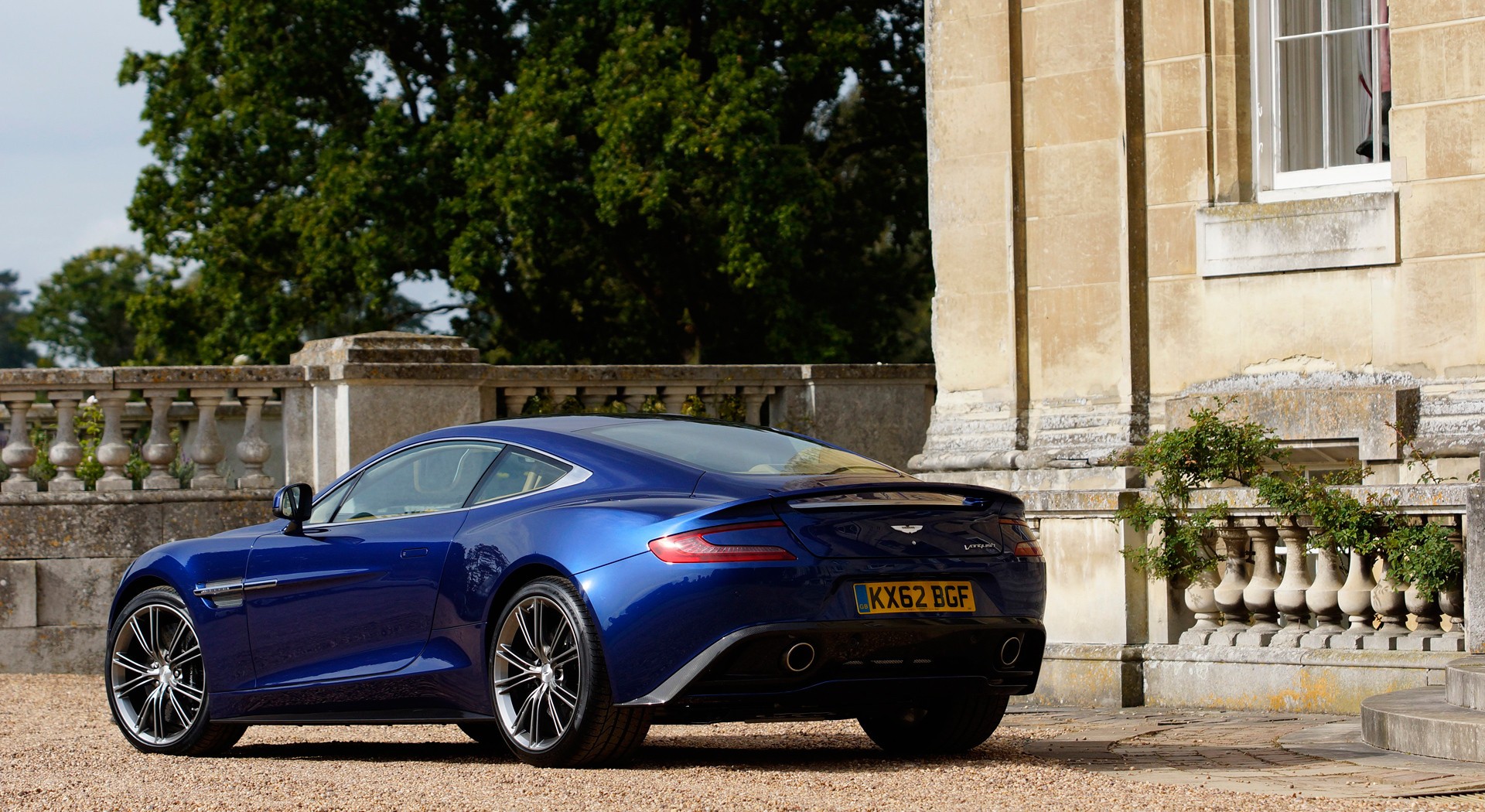 Aston Martin Vanquish blue parked