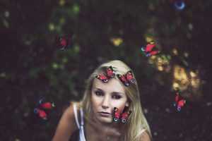 blonde girl mood butterflies